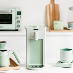 3-liter instant hot water dispenser, desktop water heater, with 8 temperature settings and 5 water volume options, quickly heats up, highly suitable for home and office use, featuring a warm and pleasant light green design.